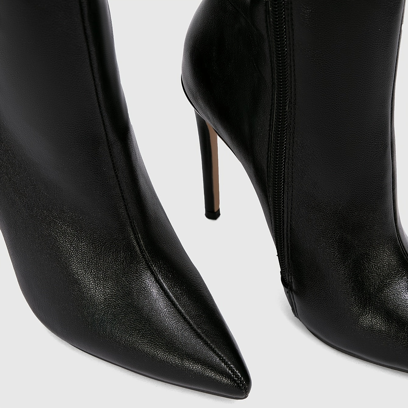 WL Atelier | Black Pointed-Toe Stiletto Ankle Boots with Golden Zipper