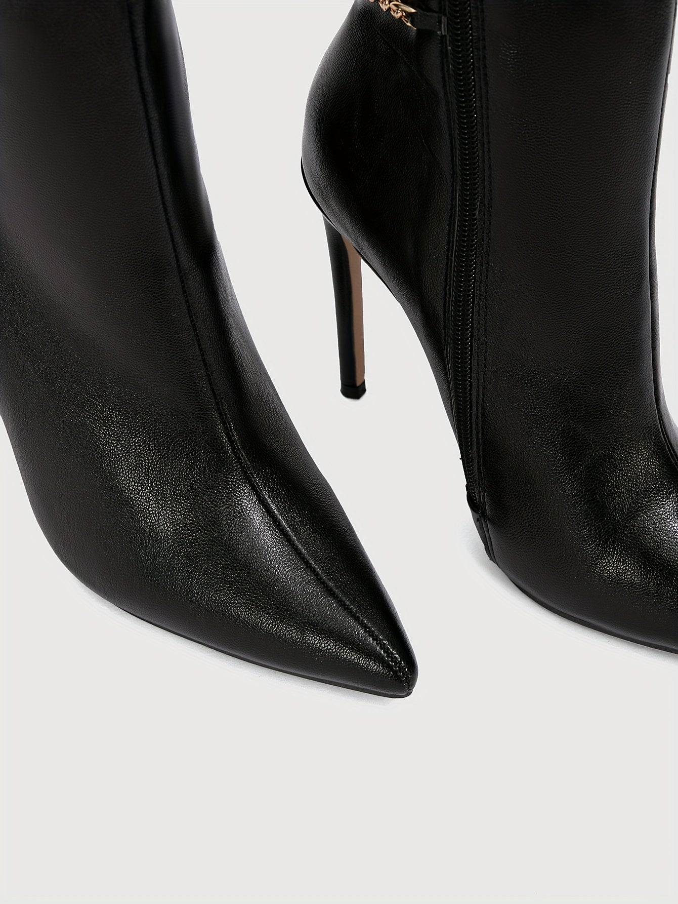 WL Atelier | Black Pointed-Toe Stiletto Ankle Boots with Golden Zipper