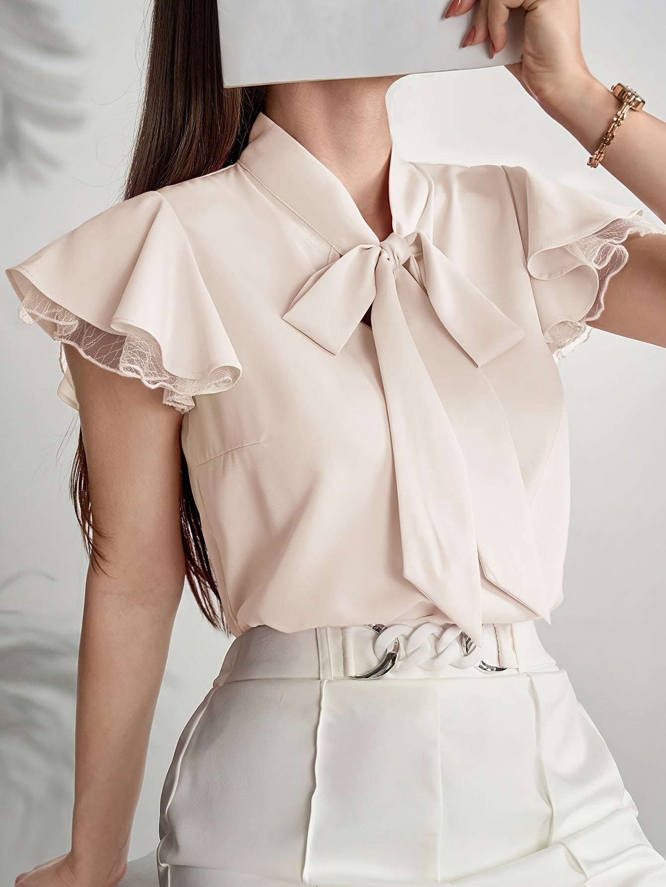 Soft Beige Tie-Neck Blouse with Ruffled Elegance