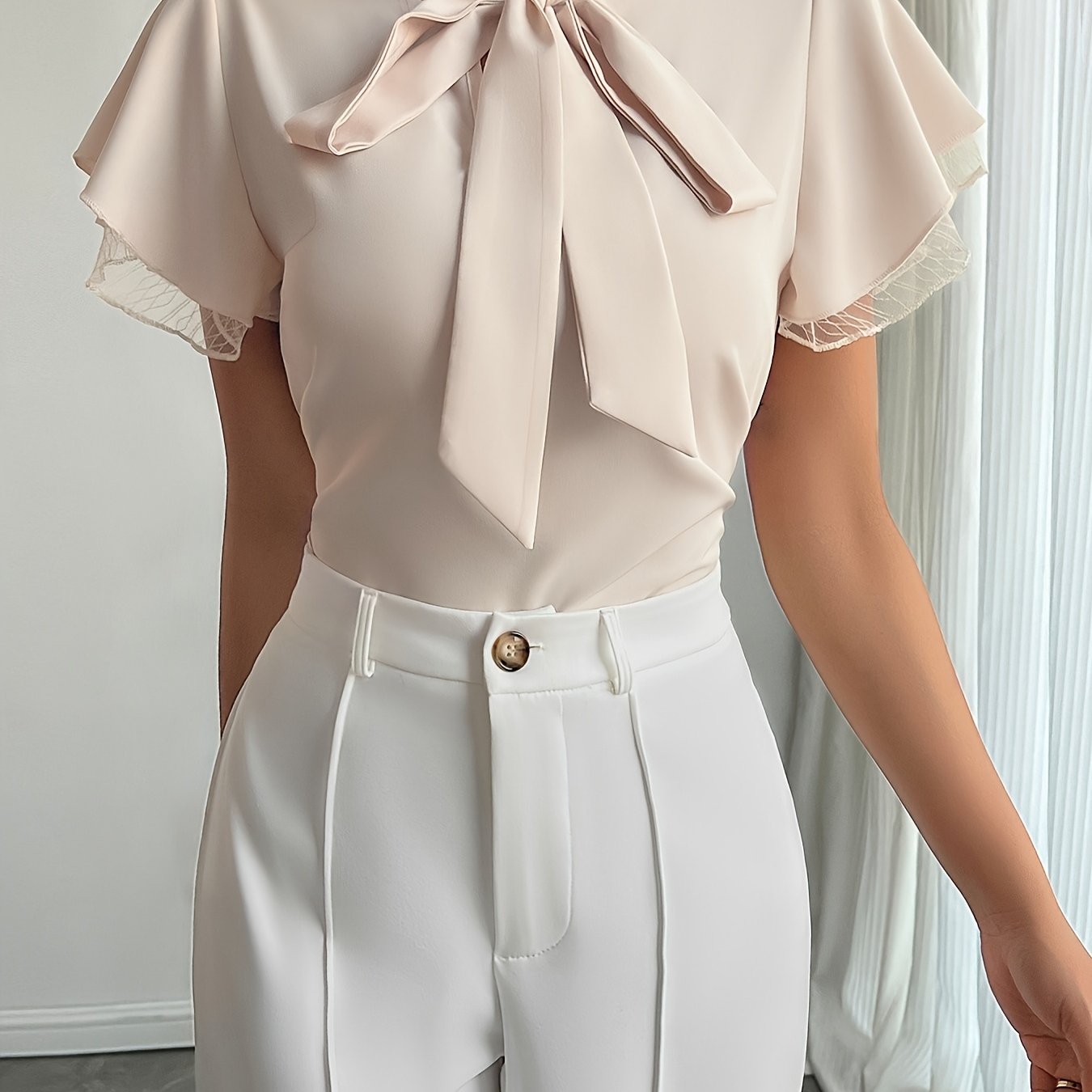 Soft Beige Tie-Neck Blouse with Ruffled Elegance